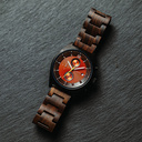 Phoenix is made of Black Sandalwood, featuring an orange dial.