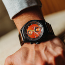 Phoenix is made of Black Sandalwood, featuring an orange dial.