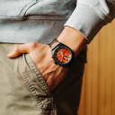 Phoenix is made of Black Sandalwood, featuring an orange dial.