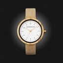 Inspired by contemporary Nordic minimalism. The NORDIC Copenhagen features a 36mm diameter white olive wood case with a white dial and gold details. Handmade from sustainably sourced wood and combined with an ultra soft beige sustainable vegan leather str