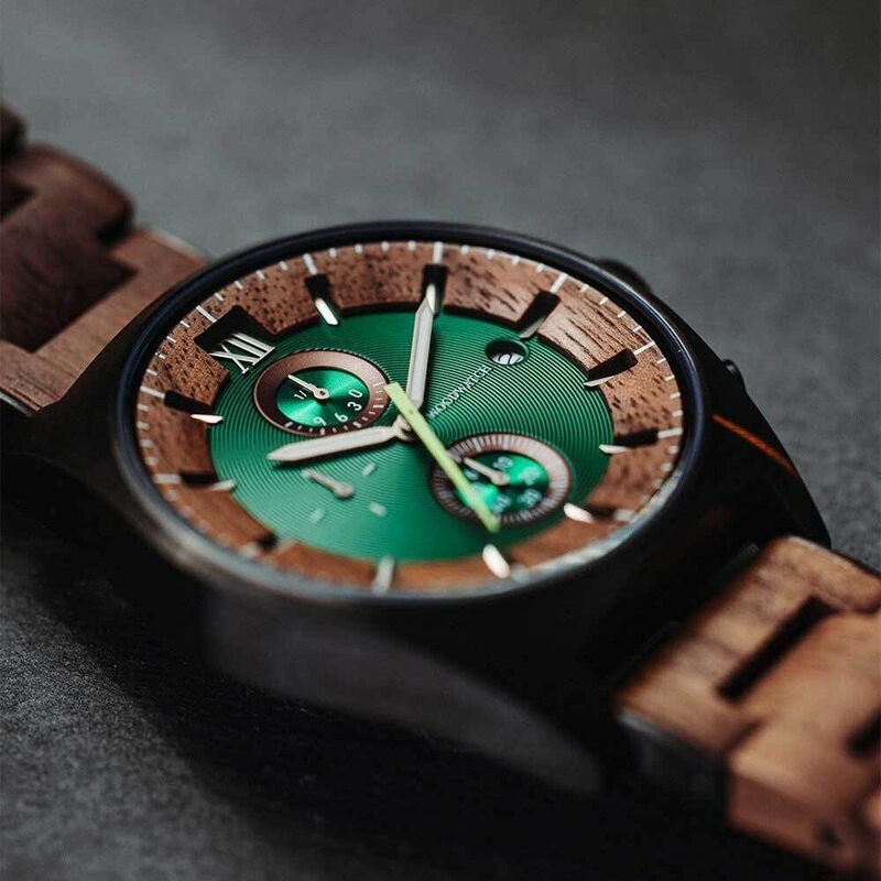 Verdant is made of Acacia wood, featuring a green dial.