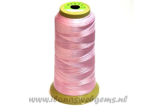 Large roll of basting thread light pink