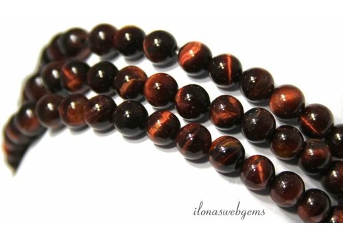 Tigereye red beads around about 6mm