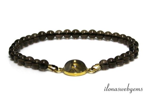 Inspiration bracelet with smoky quartz and connector on elastic