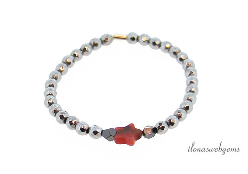 Inspiration: Silver Hematite bracelet with Rhodonite star