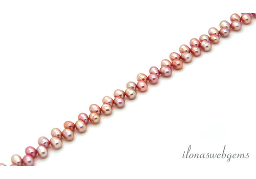 Freshwater pearls pink side drill about 6x5mm