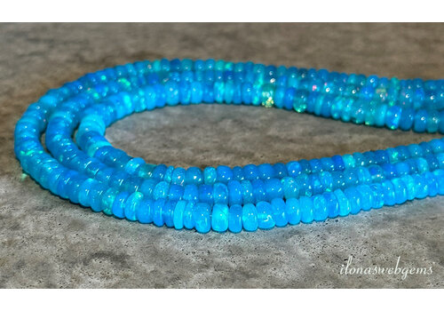 Edelopaal kralen blauw rondel op-en-aflopend ca. 5x2,5mm tot 4x1mm