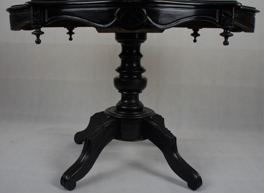 This romantic table was restored a few years ago and painted in black.
