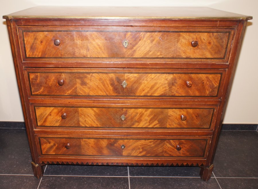 Antique chest of drawers in various types of wood