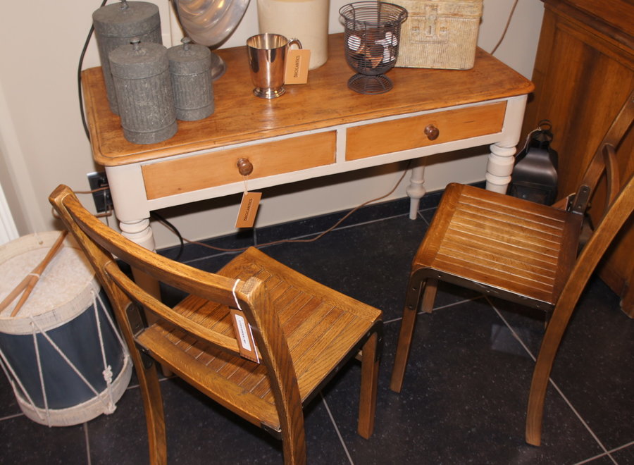 Oak chair with metal reinforcement on the side