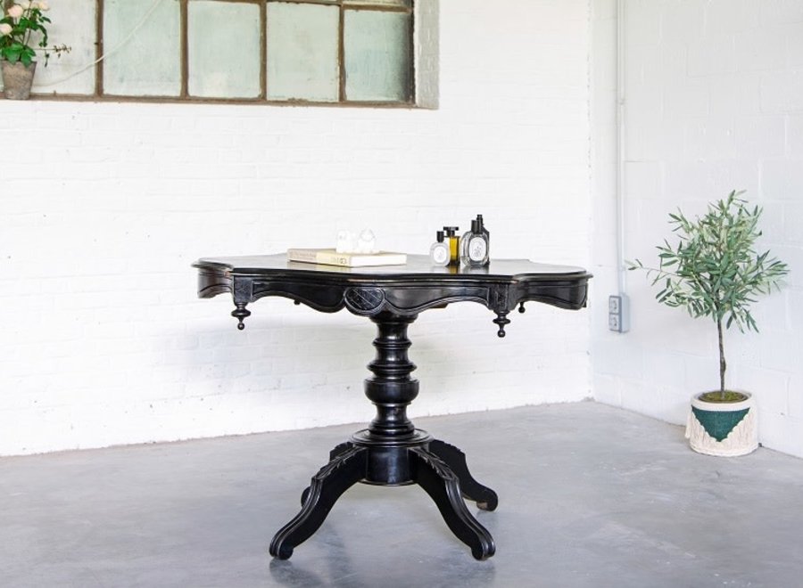 This romantic table was restored a few years ago and painted in black.