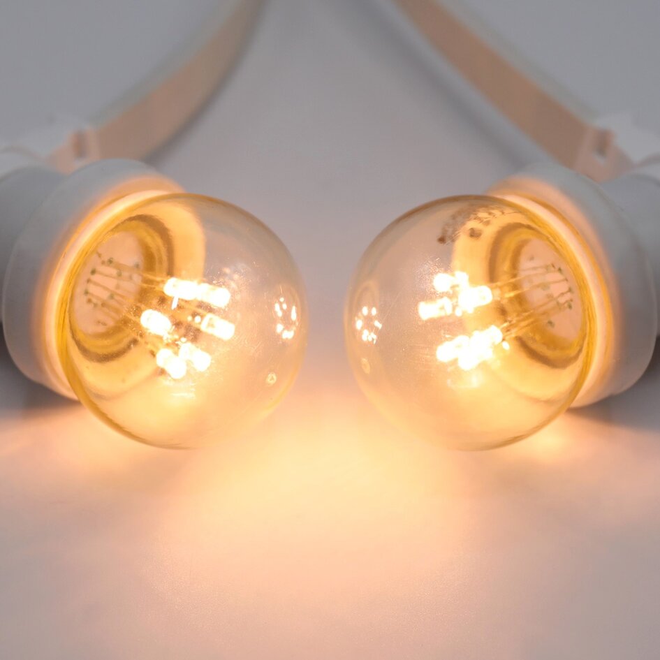 Prikkabel set met 0,7 watt lampen met LEDs op stokjes, met witte prikkabel
