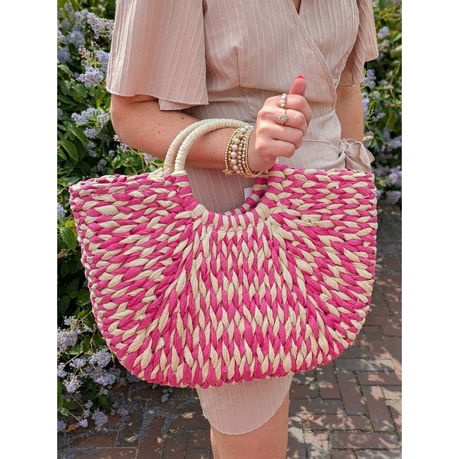 Gevlochten strandtas met rond handvat fuchsia