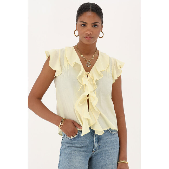 Gele mouwloze top met ruffles & strikjes