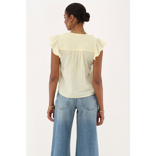 Gele mouwloze top met ruffles & strikjes