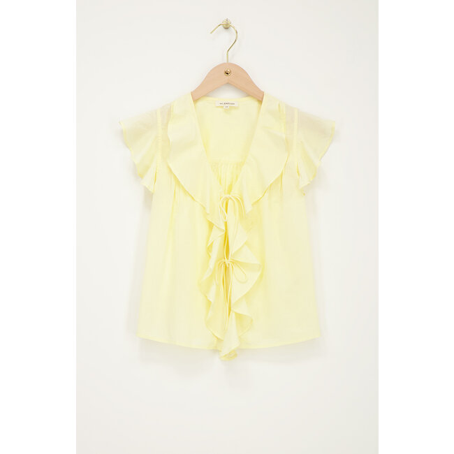 Gele mouwloze top met ruffles & strikjes