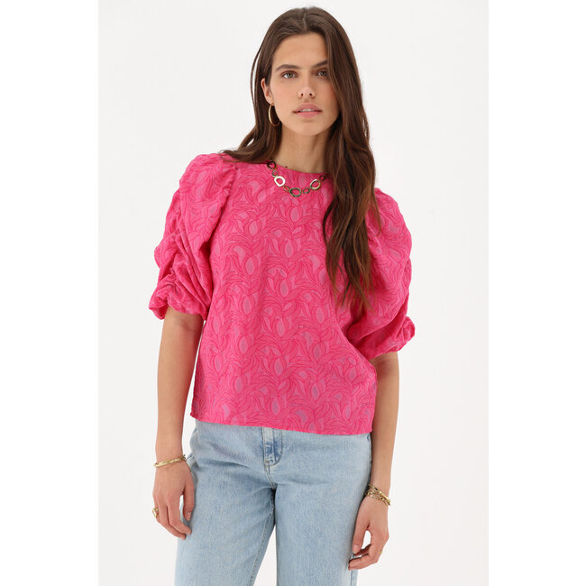 Roze jacquard top met pofmouwen en strikjes