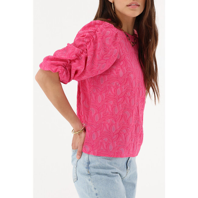 Roze jacquard top met pofmouwen en strikjes