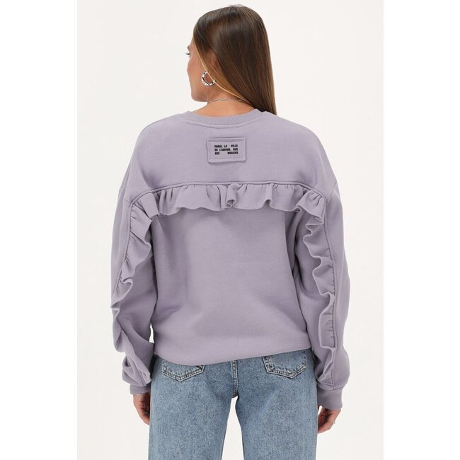 Lila sweater met ruffle en patch