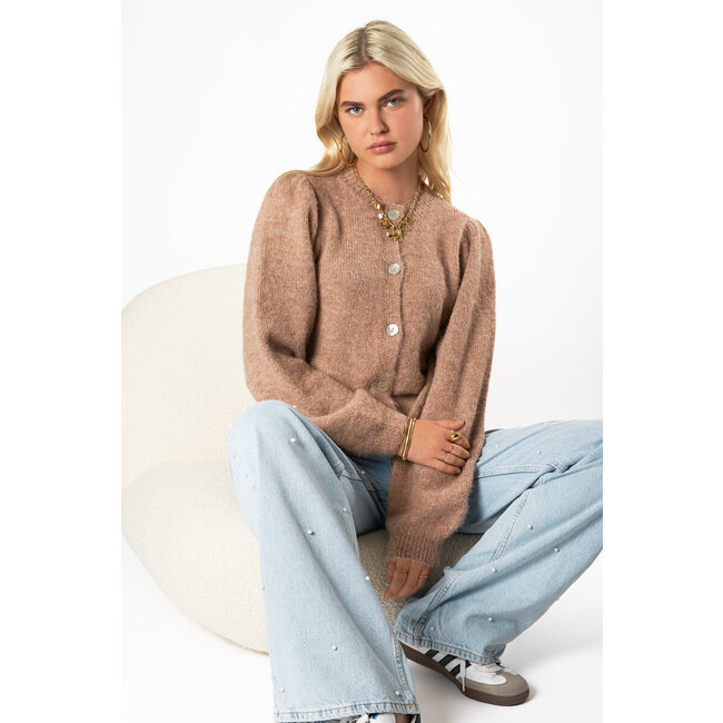 Beige vest met knopen en pofmouwen