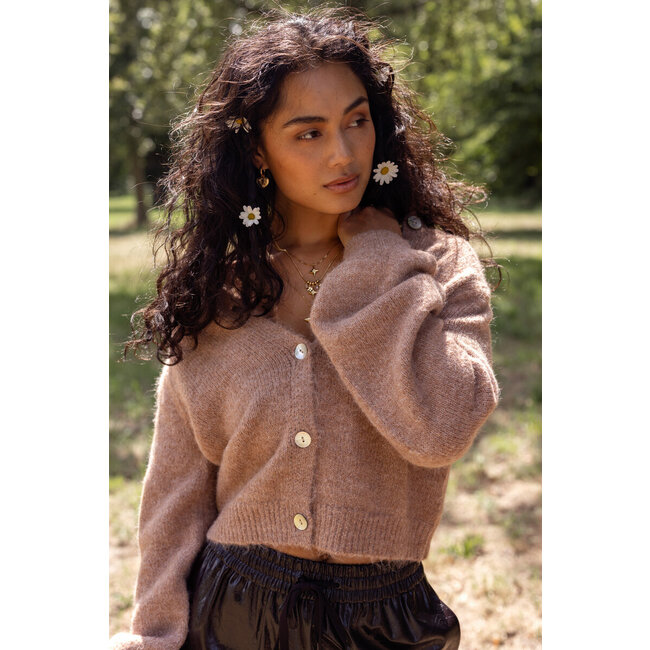 Beige vest met knopen en pofmouwen