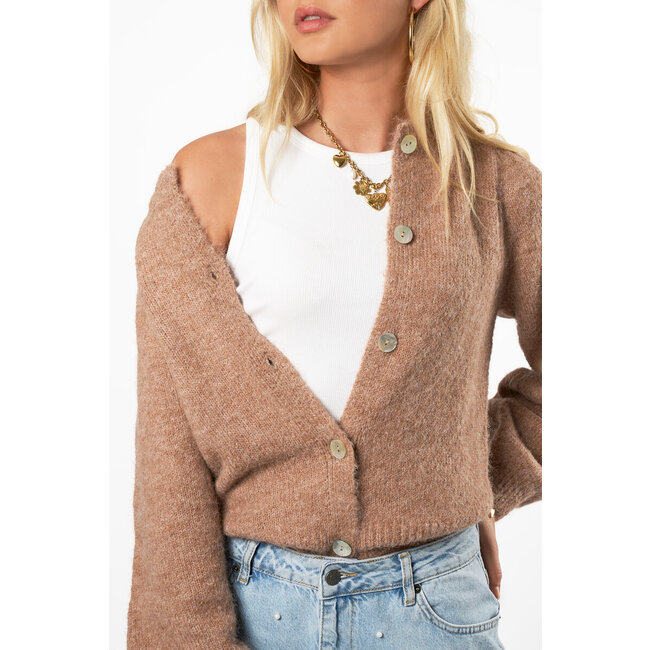 Beige vest met knopen en pofmouwen