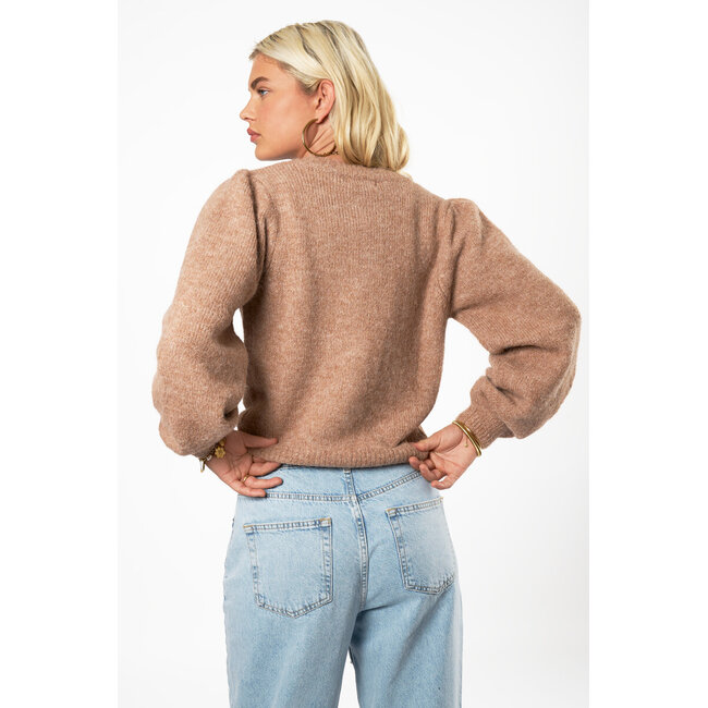 Beige vest met knopen en pofmouwen