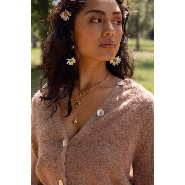 Beige vest met knopen en pofmouwen