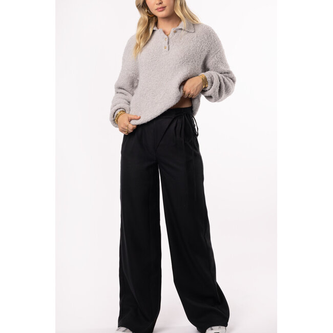 Zwarte broek met overlapping