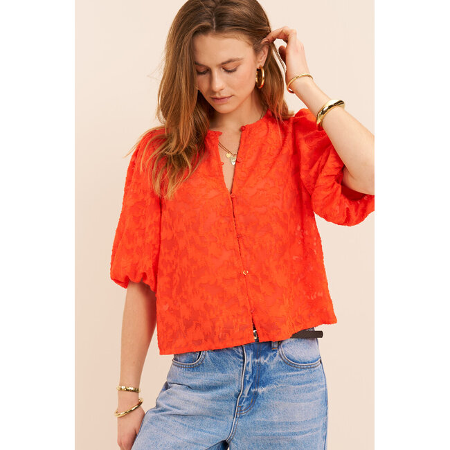 Oranje jacquard top met korte pofmouwen