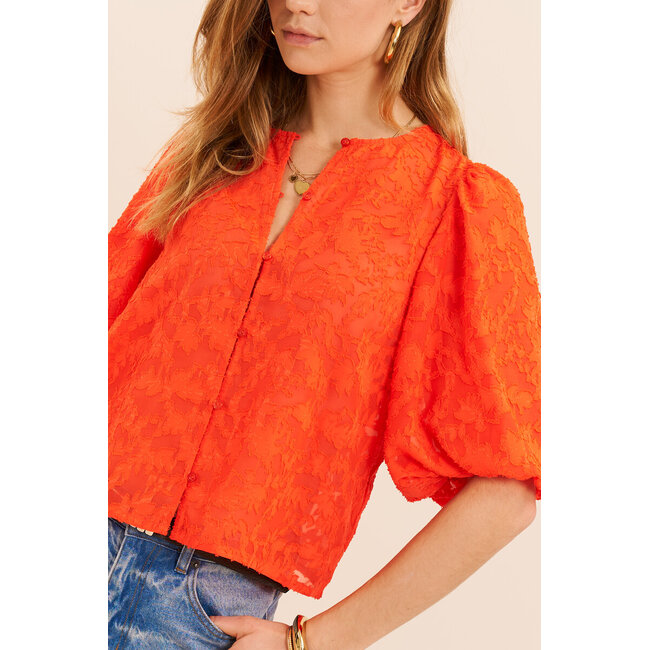 Oranje jacquard top met korte pofmouwen