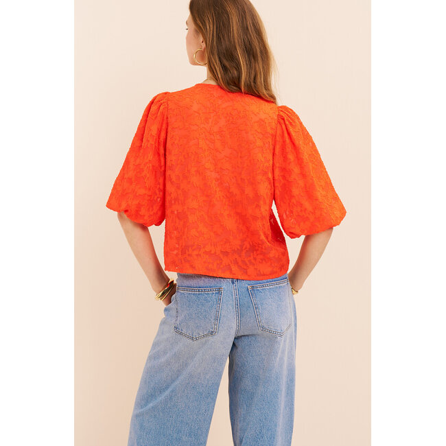 Oranje jacquard top met korte pofmouwen