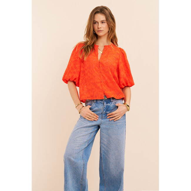 Oranje jacquard top met korte pofmouwen