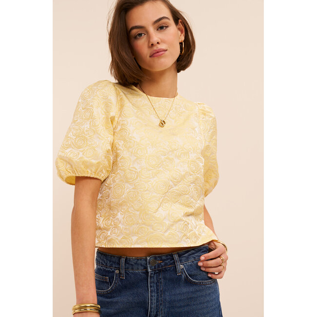 Gele top met bloemen reliëf en pofmouwen