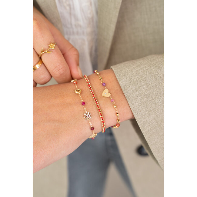 Armband met hartjes hanger & paarse kralen