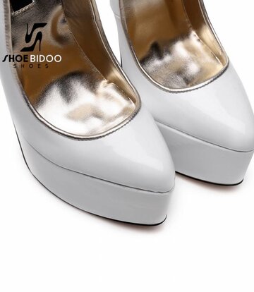 SLICK White lacquer platform pumps with ultra high gold metal heels