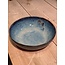 artisann In the mold laid round dish of Belgian clay with a beautiful Floating blue highly fired glaze.