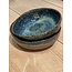 artisann In the mold laid round dish of Belgian clay with a beautiful Floating blue highly fired glaze.