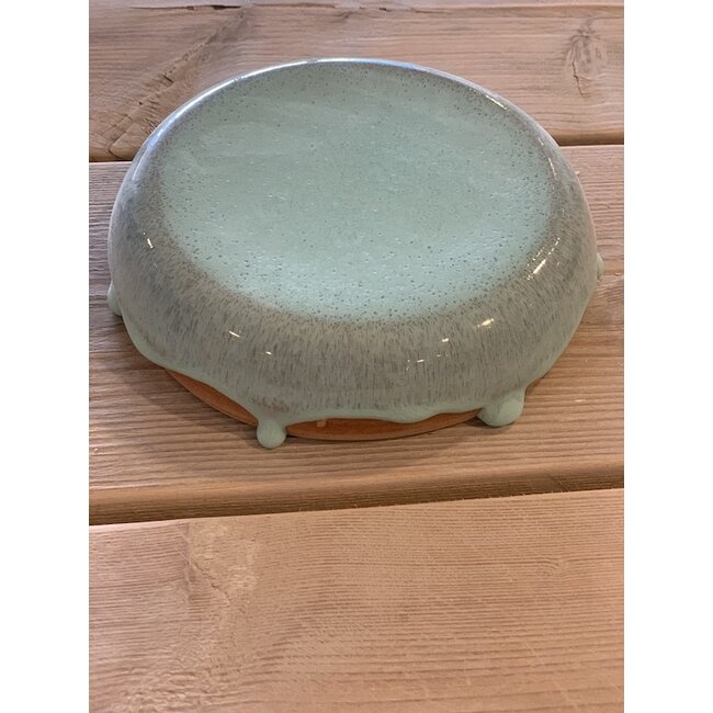 artisann With the turntable handmade presentation stone of Englisch speckled Pottery Clay with a beautiful Floating lightblue turkis high-firing glaze.