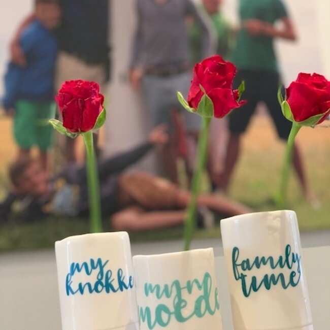 "My Knokke" speak for themselves in a unique porcelain vase in cylinder form