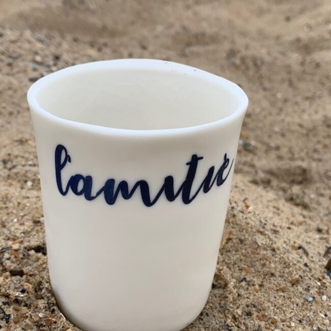 "Amitié, Plaisir" two valuable words in our lives and now baked on porcelain. For sale at Artisann in Knokke.