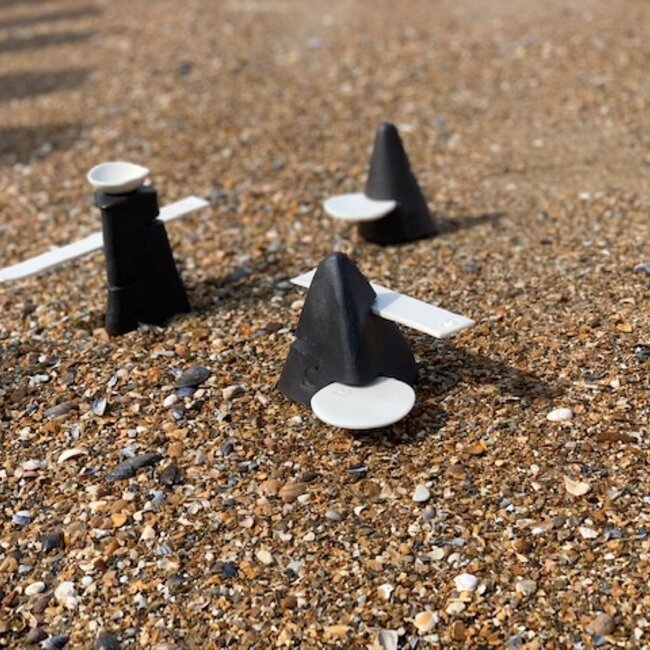 Handmade table ornament in a pyramide shape with porcelain accessories