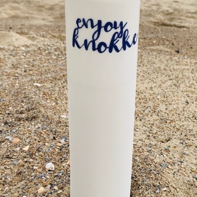 "Enjoy Knokke" speak for themselves in a unique porcelain vase in cylinder form