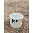 artisann "You Me Moi Toi " with a transfer baked on a porcelain handmade cup, drinking cup