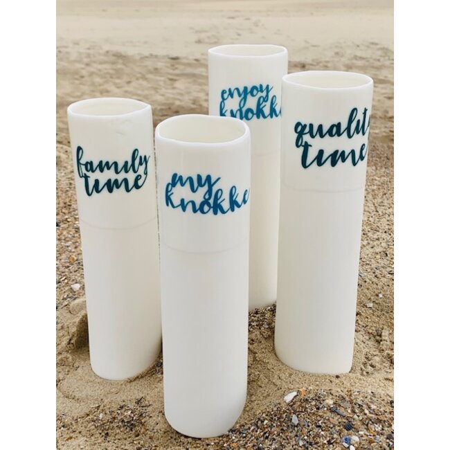 artisann "Enjoy Knokke" speak for themselves in a unique porcelain vase in cylinder form