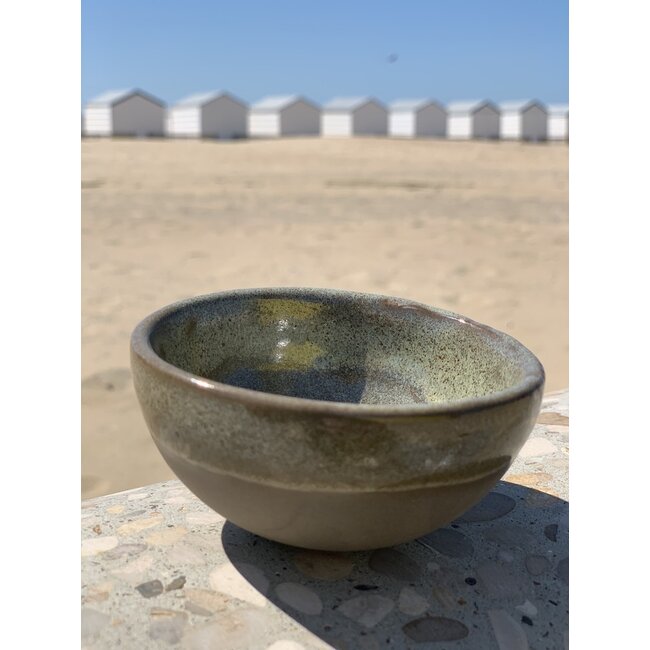 LS-design  Bowl in the shape of a hemisphere handmade in ceramic with a green border