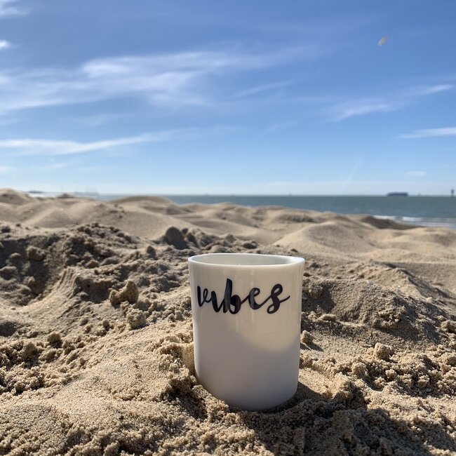 "Summer Vibes" with a transfer baked on a porcelain handmade cup, drinking cup