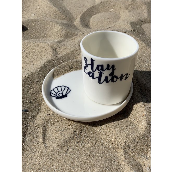 "Staycation" with a transfer baked on a porcelain handmade cup, drinking cup