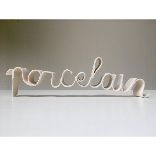 K-design The words "Porcelain Reflections"  in porcelain handwriting