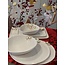 artisann Porcelain handmade Christmas service with accents of golden stars and a Christmas tree